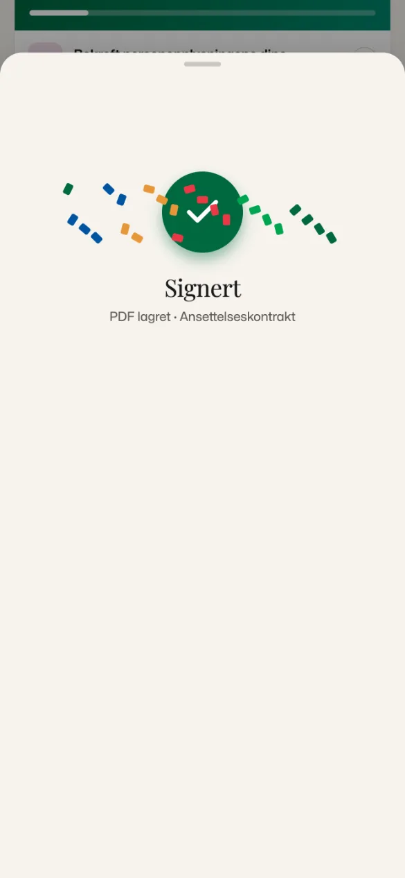 Komma-mobilappen, kontrakten er signert: grønn hake med konfetti, "Signert" og "PDF lagret · Ansettelseskontrakt".